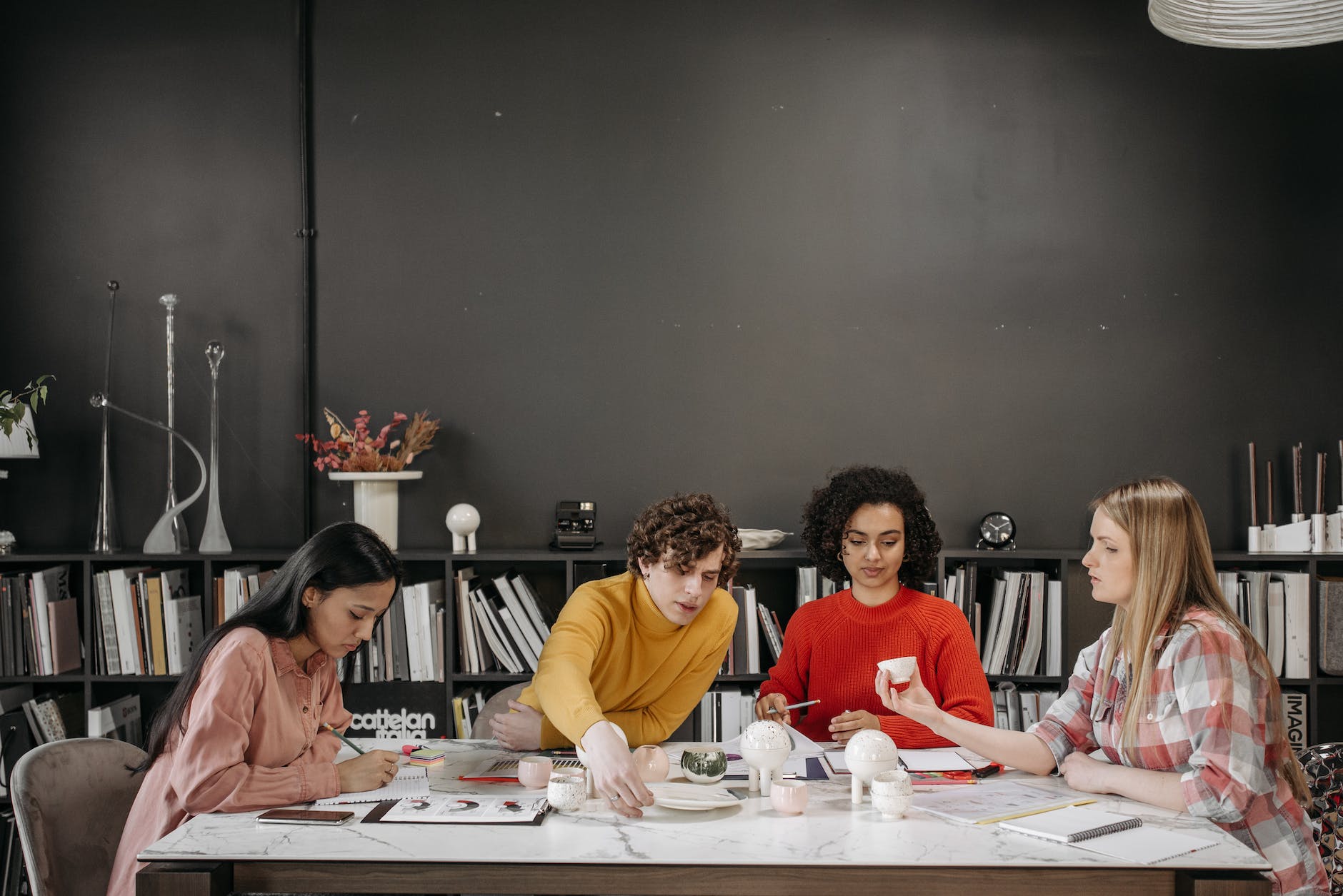 a team sitting on the table